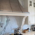 full height calacatta statuario backplash behind hood
