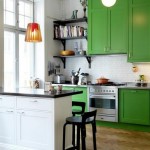 GREEN CABINETS WITH SOAPSTONE