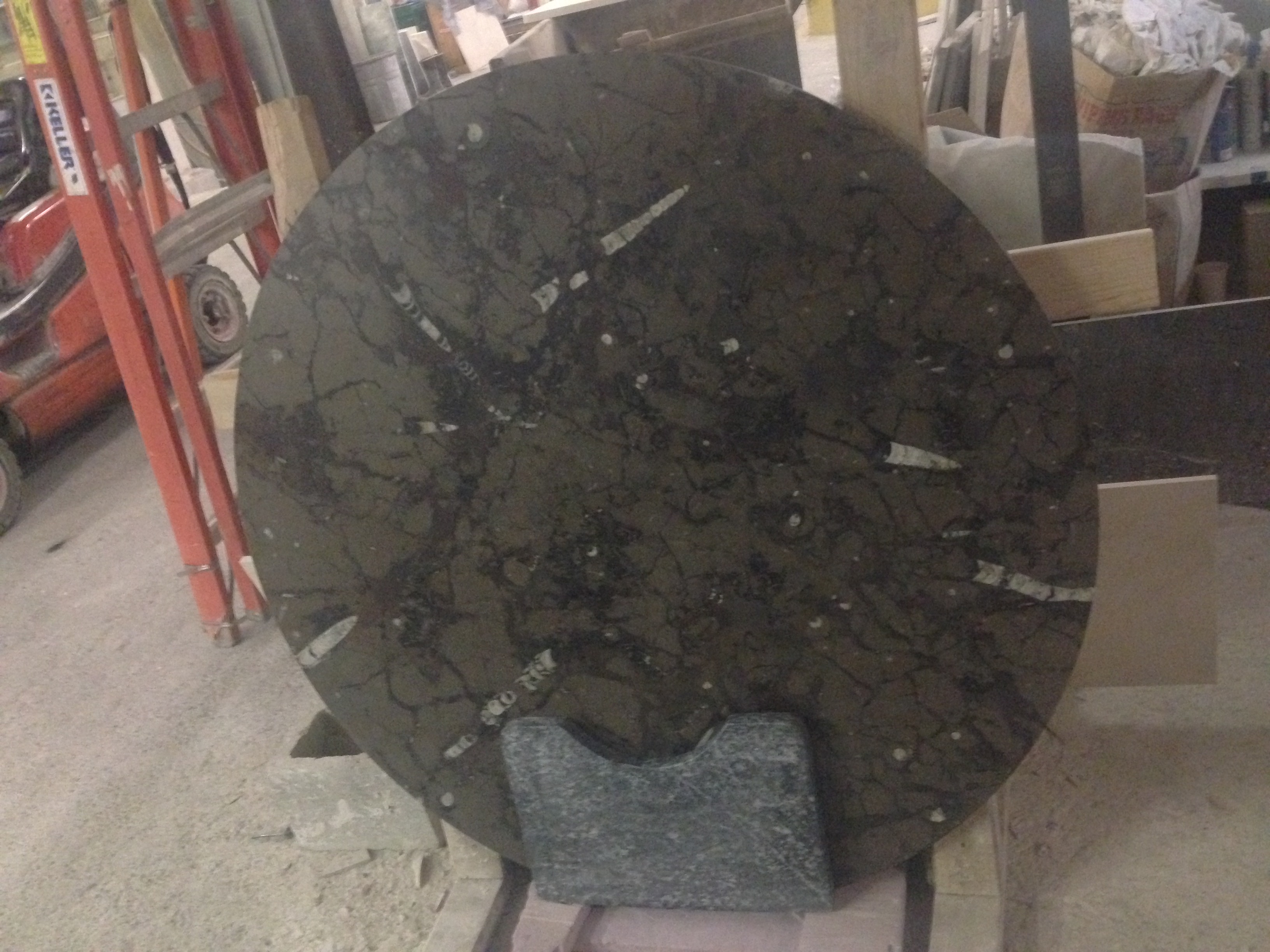 Round brown marble table