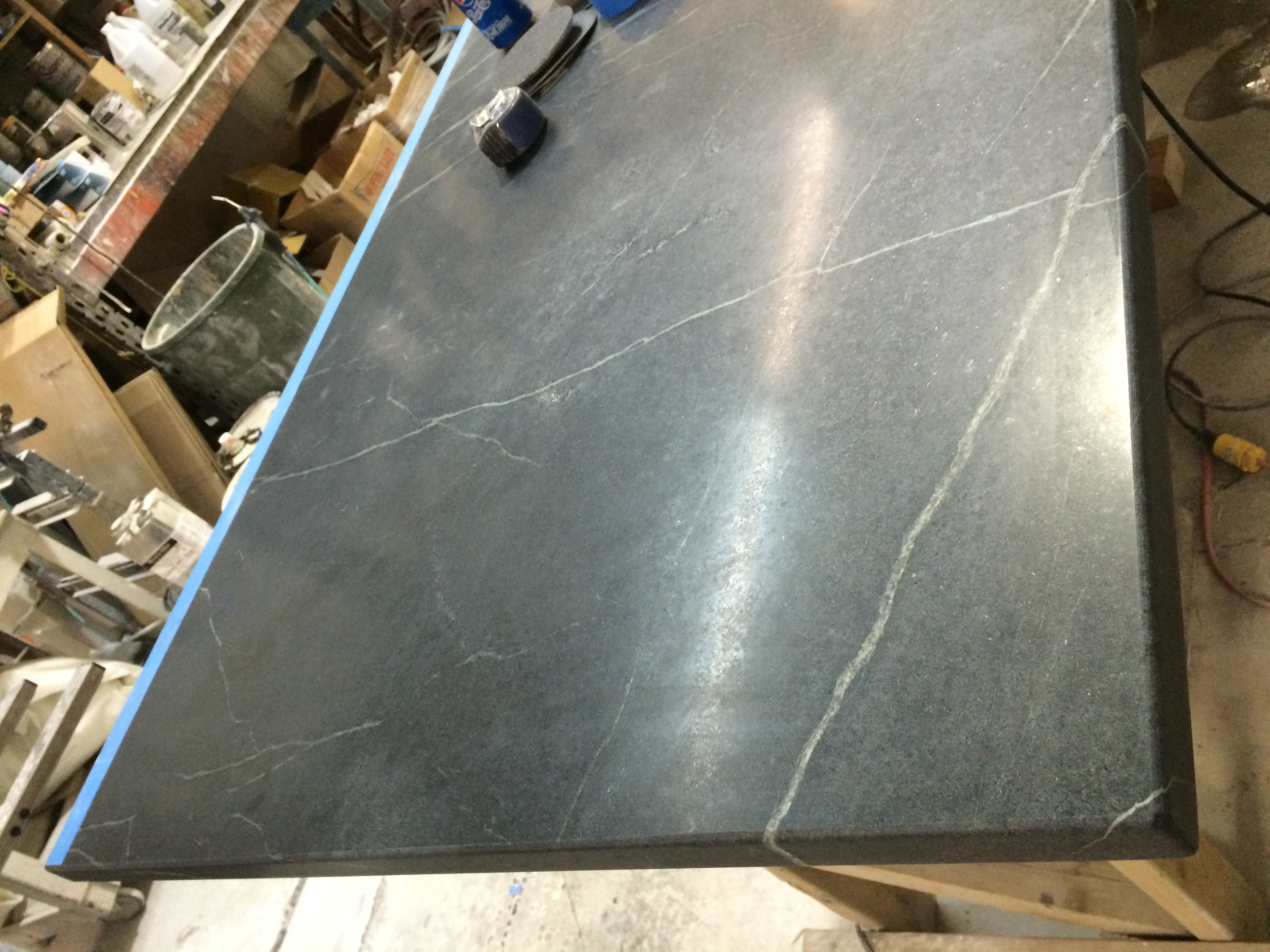 DARK  GREY SOAPSTONE ISLAND WITH VEINS