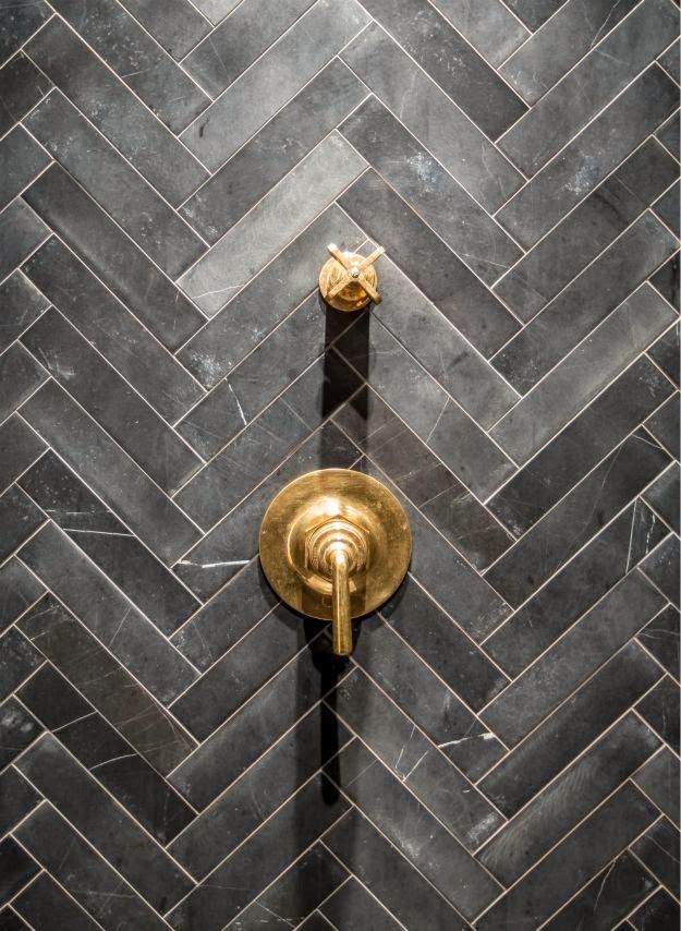 Gray herringbone shower wall